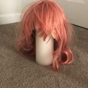 Pink wig.